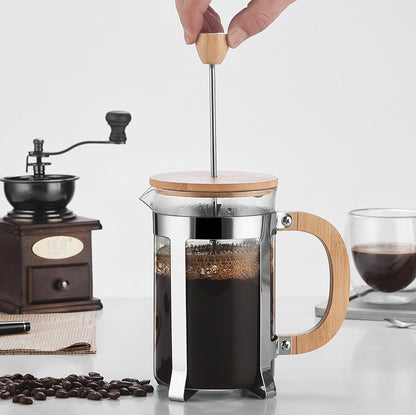 Stylish French press with bamboo accents for fresh, easy coffee brewing.