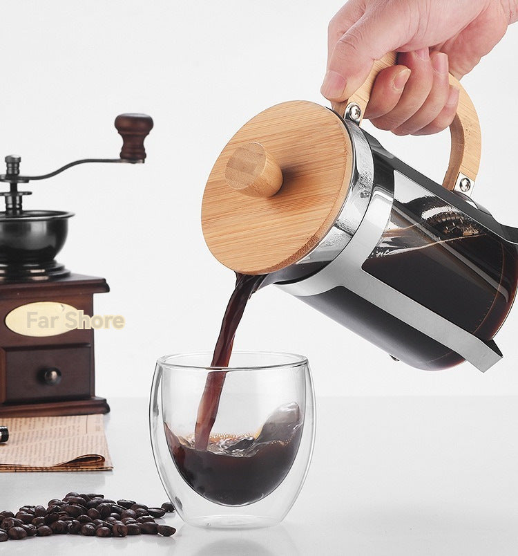 Stylish French press with bamboo accents for fresh, easy coffee brewing.