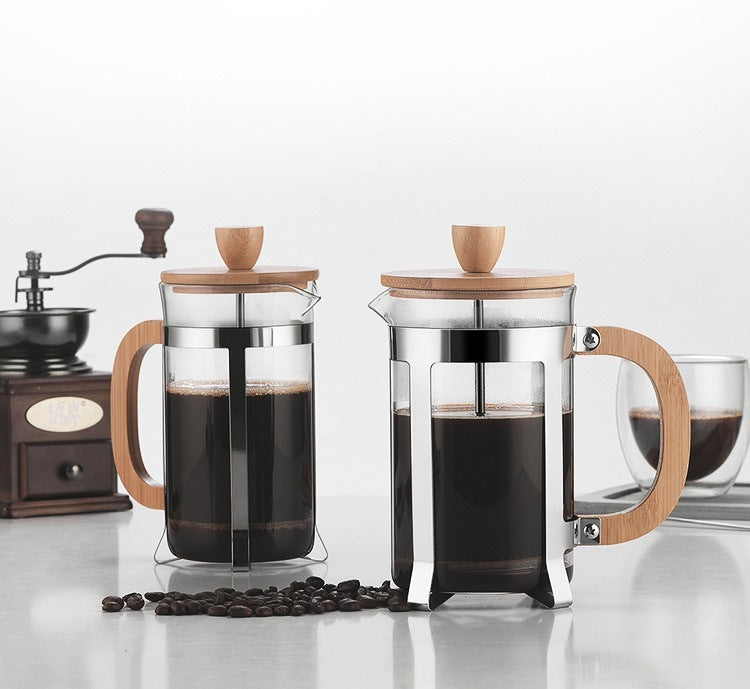 Stylish French press with bamboo accents for fresh, easy coffee brewing.