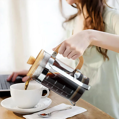 Stylish French press with bamboo accents for fresh, easy coffee brewing.