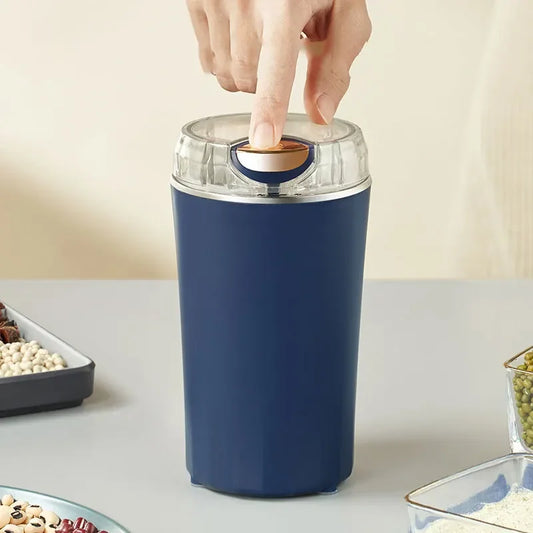 Compact and versatile electric grinder, perfect for coffee and kitchen use.